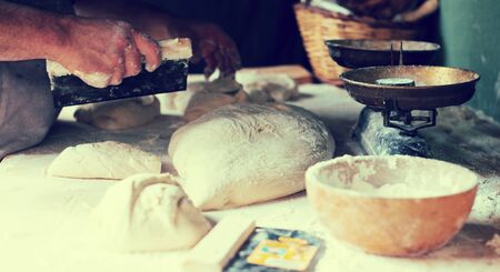 process of making bread in a traditional bakeryの写真素材