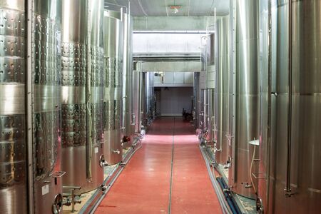 huge metal vats for fermentation of large wine factoryの写真素材
