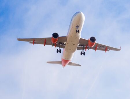 BARCELONA, SPAIN - MARCH 09, 2017:  EasyJet plane landing in El Prat Airport on time. Barcelona, Spainのeditorial素材