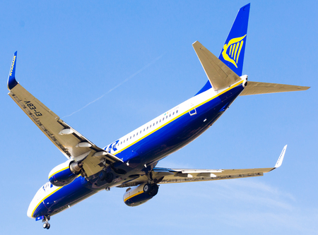 BARCELONA, SPAIN - MARCH 09, 2017:  Ryanair Airlines plane landing in El Prat Airport on time. Barcelona, Spainのeditorial素材
