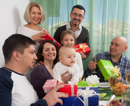 Multigenerational family at home congratulating happy baby with him birthdayの写真素材