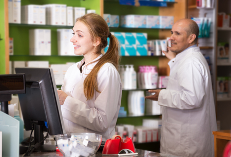 Team of pharmaceutists working in chemist shopの写真素材