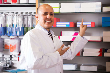 Portrait of male pharmacists posing in  farmacyの写真素材