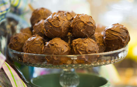 fine chocolate truffles in a crystal vaseの写真素材