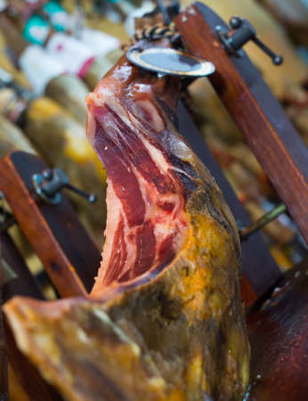 Delicious spanish gammon of bacon on standの写真素材