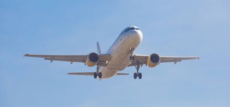 BARCELONA, SPAIN - MARCH 09, 2017:  Vueling Airlines plane landing in El Prat Airport on time. Barcelona, Spainのeditorial素材