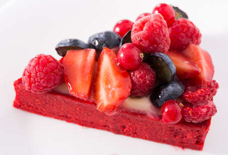 Delicious cake with fresh forest berriesの写真素材