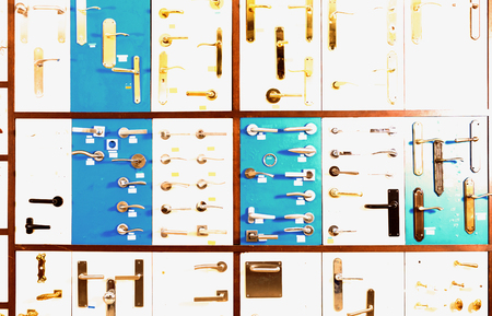 Stand with metal door handles in storeの写真素材