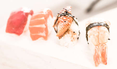 Series of four kinds Nigirisushi. Focus on ebiの写真素材
