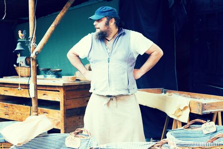 male baker working in street bakeryの写真素材