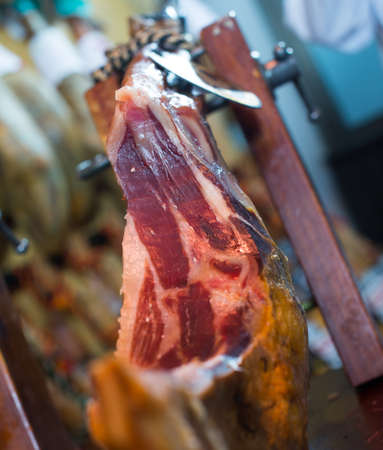 tasty spanish gammon of bacon on standの写真素材