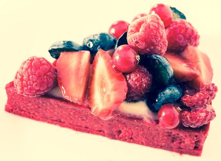 Delicious cake with fresh forest berriesの写真素材