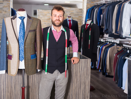 Seller is pleased by created image in men shop.の写真素材