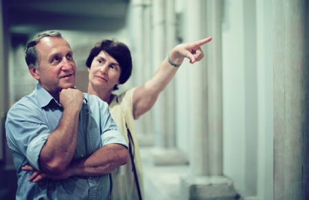 mature pensioner family visiting historical exhibition in National Museumの写真素材