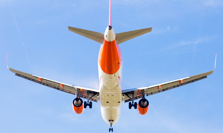 BARCELONA, SPAIN - MARCH 09, 2017:  EasyJet plane landing in El Prat Airport on time. Barcelona, Spainのeditorial素材