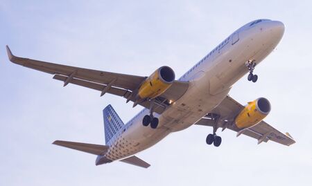 BARCELONA, SPAIN - MARCH 09, 2017:  Vueling Airlines plane arriving at El Prat Airport on schedule. Barcelona, Cataloniaのeditorial素材