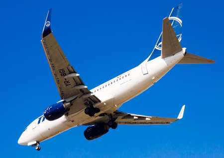 BARCELONA, SPAIN - MARCH 09, 2017:  Tarom Airlines plane arriving at El Prat Airport on schedule. Barcelona, Cataloniaのeditorial素材
