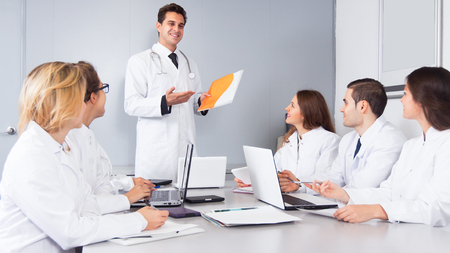 doctor chief speech at meeting in officeの写真素材