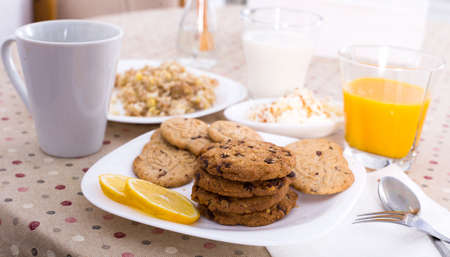 plate of cookies with limon for breakfastの写真素材