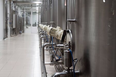 large metal vats for fermentation of wineryの写真素材