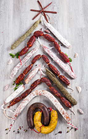 Christmas tree made of various kinds of sausagesの写真素材