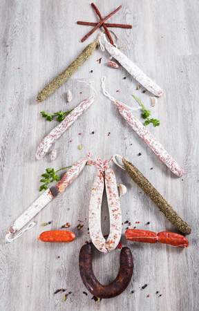 Christmas tree made of various kinds of sausagesの写真素材