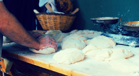 process of making bread in a traditional bakeryの写真素材