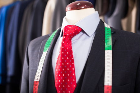 Elegant jacket with shirt and tie on mannequinの写真素材