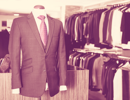 Chic Male costume on a mannequin in men clothing storeの写真素材