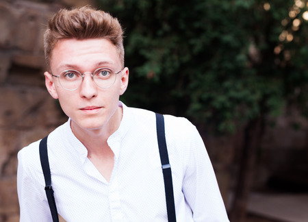 young man posing in gothic quarter of Barcelonaの写真素材