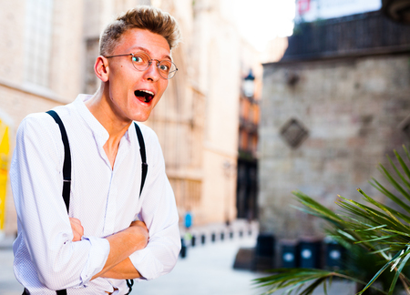 young man posing in gothic quarter of Barcelonaの写真素材