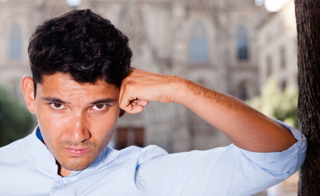 portrait of young man in European city