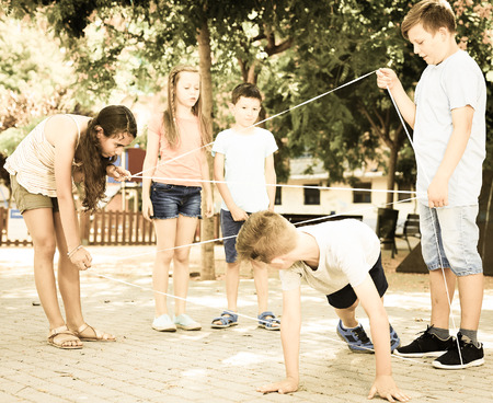 active children games. passing through the tangled ropeの写真素材