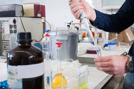 flasks, test tubes in chemical laboratory in working environment