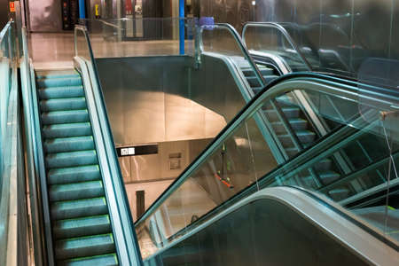 Barcelona, SPAIN - 19 April, 2019: Multilevel line escalators with metal coating in metro La Sgrera. Barcelona, Spainのeditorial素材