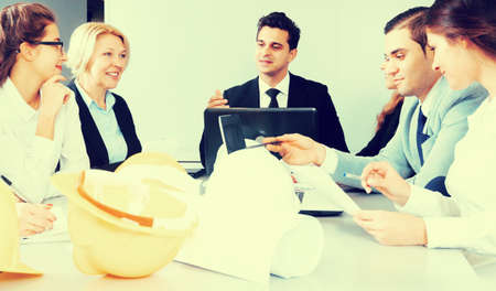 Meeting of engineers in conference room