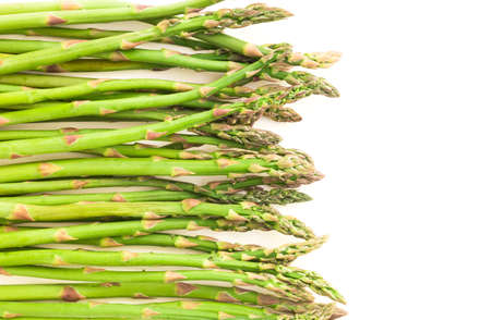 fresh cut green asparagus on white backgroundの写真素材