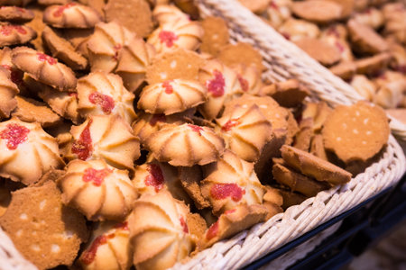 fresh crispy cookies in wicker baskets on the counter
