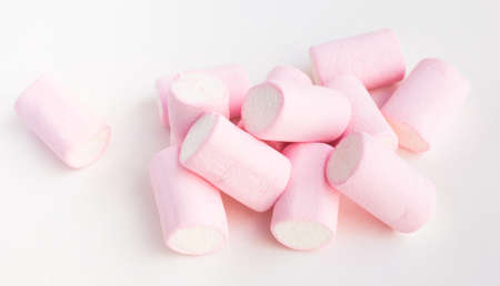 sweet pink white marshmallows on whiteの写真素材