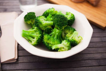 diet food. steamed broccoli on plateの写真素材