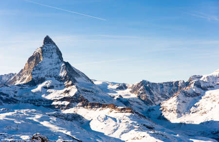 Winter mountain landscape. Snowy mountain Matterhorn during the day in winter. Zermatt, swiss alpsの写真素材