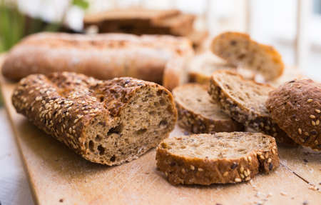 fresh loaf of bread on wooden boardの写真素材