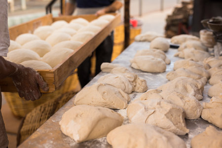 Mass of yeast dough in the bakeryの写真素材