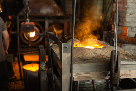 Ferrous metal billet is melted in an induction furnace closeupの写真素材