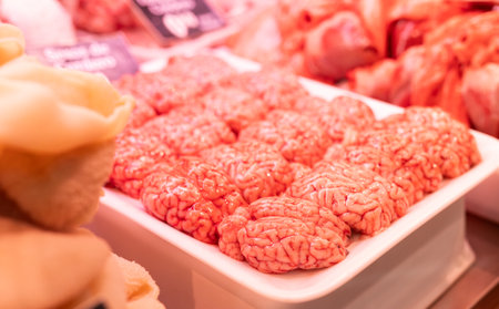 Raw lamb brains on market counterの写真素材