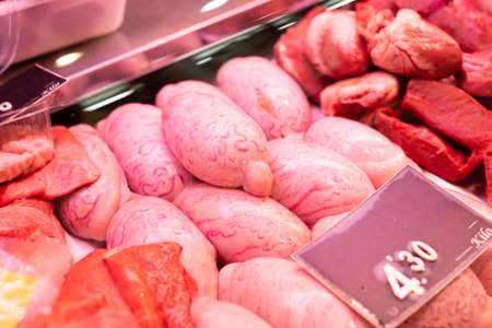 Raw lamb testicles on store counter