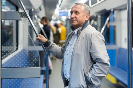 Pensioner rides in an subway carの写真素材