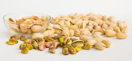 Roasted pistachios on white backgroundの写真素材
