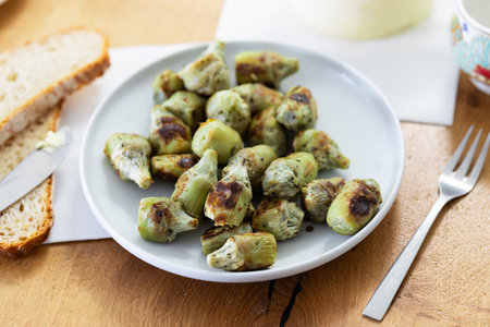 Fried artichoke hearts on a plateの写真素材
