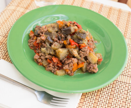 dish of vegetable stew. stewed eggplant, minced meat, carrots, peppers, onionの写真素材